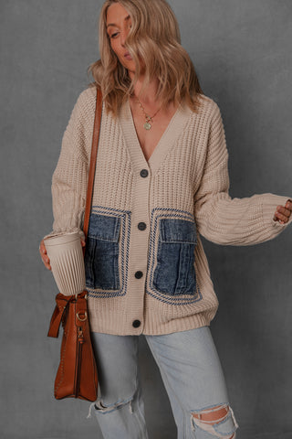 women modeling a knit sweater with denim pockets